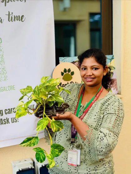 Another happy customer from our college event, holding her new Golden Pothos. Her smile says it all. Spreading the plant love is what we do.
