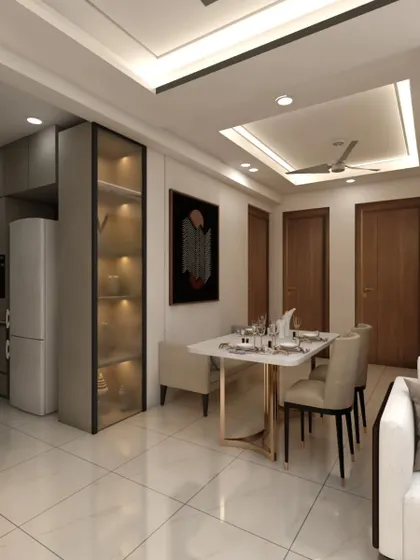 This view shows the integration of the kitchen and dining area. A glass-paneled display cabinet acts as a subtle partition, providing storage while maintaining a visual connection between the two spaces.