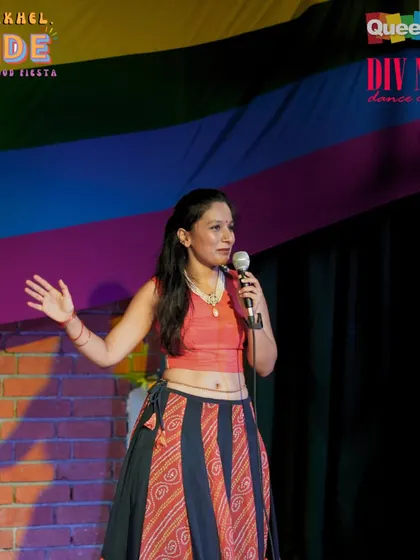 Our co-founder Divya addressing the audience at 'Naach.Khel.Pride'. We believe in using our platform to share messages of love and inclusivity.