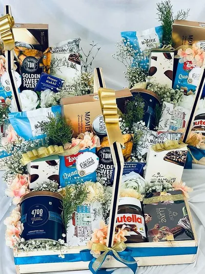 We take pride in creating hampers that are not only delicious but also beautifully presented, as seen in this stunning arrangement.