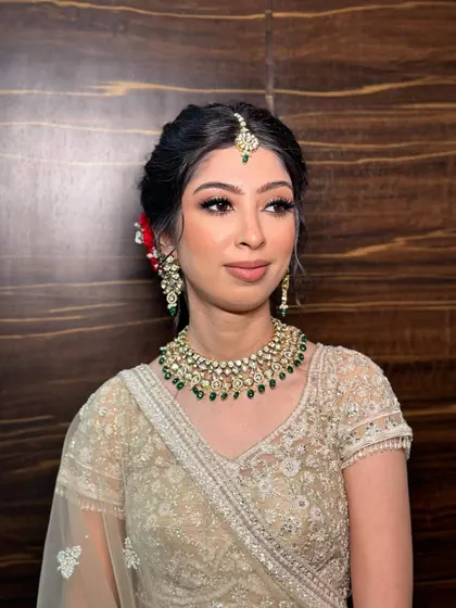 A captivating look for Kanika's Pheras. Her radiant glow and beautifully defined eyes were the focus of this elegant bridal makeup.