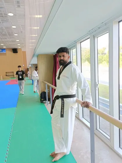 A moment of rest at the barre in one of the training halls.