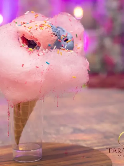 Iced Cotton Candy is like eating a cloud of happiness. We combine colorful ice cream with fluffy cotton candy for a whimsical dessert that delights kids and adults alike.