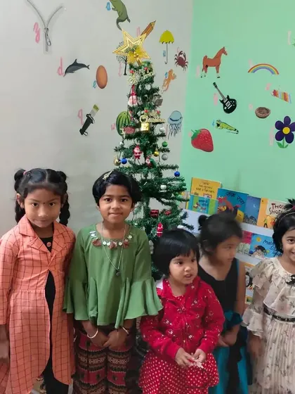 Our girls dressed up for the Christmas celebration at Ken. It's a time for joy, friendship, and festive fun.
