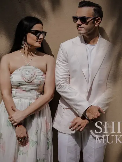 A modern and fashionable pre-wedding portrait using strong shadows and composition.