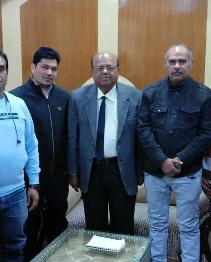 Pictured here with senior members and colleagues during a meeting to formalize our plans for community legal aid.