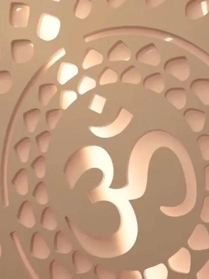 A detailed shot of the backlit 'Om' jali panel, showing the clean cuts and even illumination.