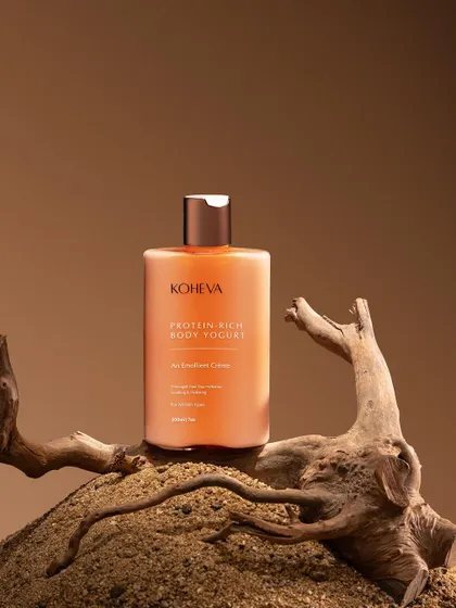 This shot for Koheva's Body Yogurt uses natural elements like sand and driftwood to create an earthy, grounded, and luxurious feel. The textures and monochrome color palette work together to build a strong, organic mood.