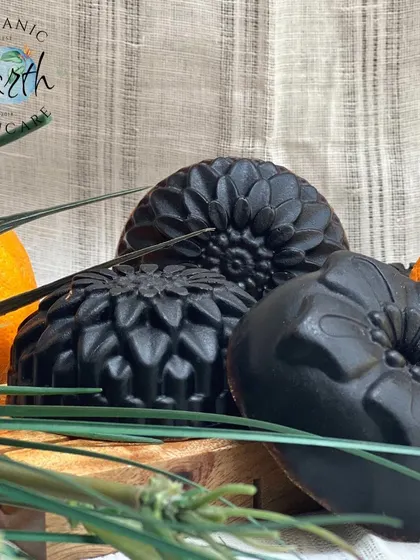 A collection of my 'Wake Me Up' coffee and charcoal soaps. The different floral molds add a touch of elegance to these powerful detoxifying bars.