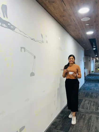 At the very beginning of a big project, standing in front of a huge, empty wall with big dreams for it. This was the start of the RHI Magnesita mural.