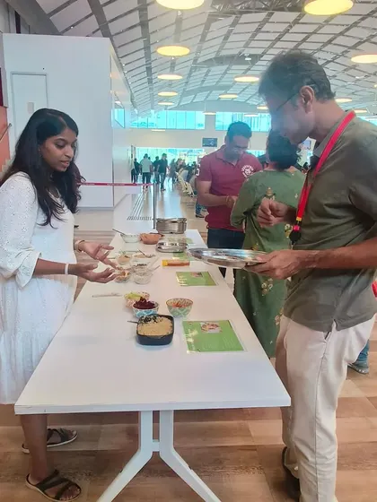Here I am guiding an employee through our DIY food station. I focus on one-on-one interactions to answer questions and make nutrition feel personal and approachable, helping to build confidence in making healthier choices.