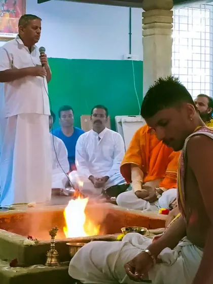 A sacred Homa (fire ceremony) at the university, with Guruji speaking. These traditional rituals are an integral part of the yogic path and our training.