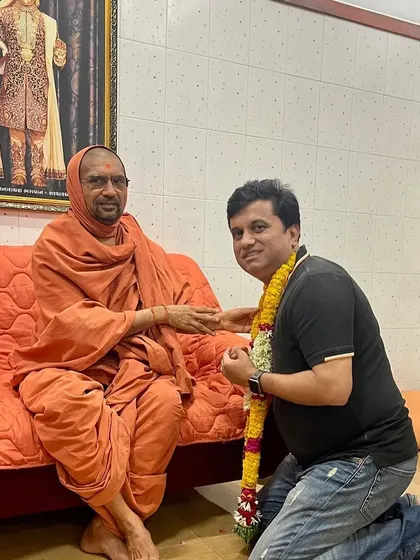 Our director receiving blessings from a revered Swamiji. These moments of spiritual connection are at the heart of our mission, reminding us of the deeper purpose behind our work.
