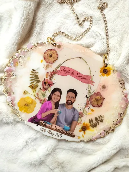 One of the prettiest frames I've made. This oval-shaped wall hanging features a custom illustration blended seamlessly with preserved florals and crystals.