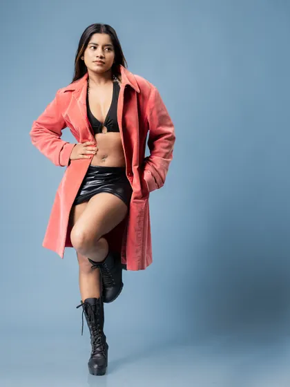 A full-length shot of the same look, creating a powerful fashion statement.
