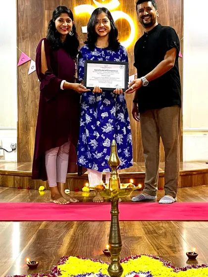 We celebrate each student's journey. Here, we are presenting a certificate of completion, marking the successful end of a transformative training program.