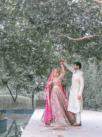 A beautiful wide shot of the couple dancing.