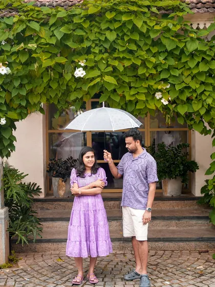 A different take from the umbrella series, focusing on a moment of playful disagreement that adds personality to the story.