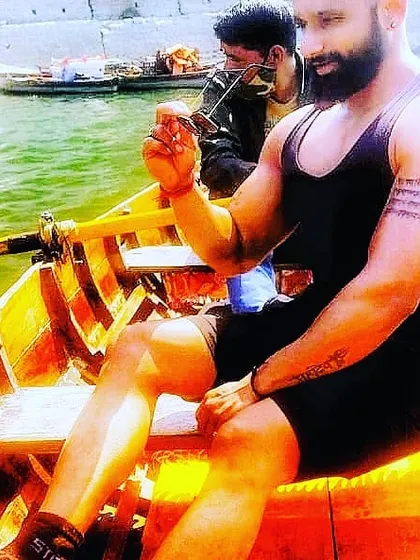 Enjoying an outing on a boat. This is what it's all about: having the vitality to say yes to adventure. Your fitness journey supports the life you want to live outside the gym.