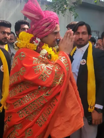 Dressed in traditional attire, accepting the good wishes of my supporters.