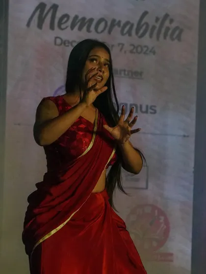 An expressive moment from a student's dance performance during the cultural segment of the show.
