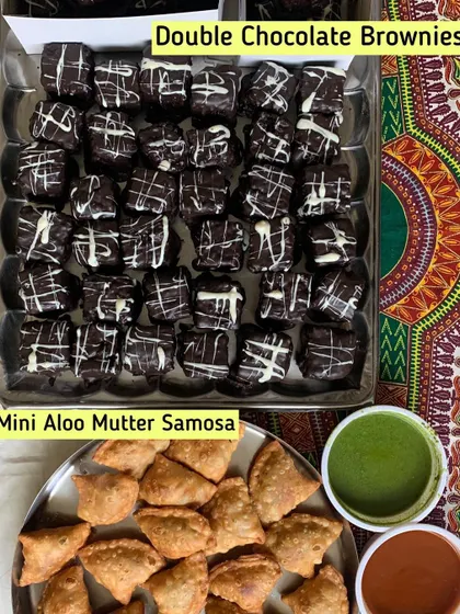 A perfect party combo of Mini Aloo Mutter Samosas and Double Chocolate Brownies.