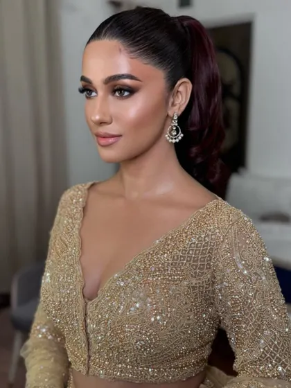 A portrait showcasing the chic and modern high ponytail.