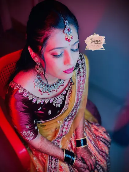 Another angle of this soft glam reception makeover. The hairstyle is kept elegant and simple to balance the detailed makeup and outfit.