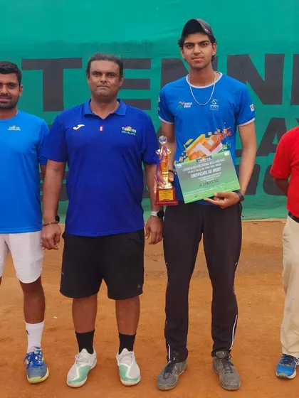 With the coach and trophy after the 4th Shri Rajesh Patel Memorial Super Series.