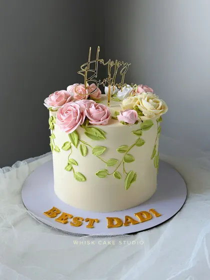 A beautiful, fully non-fondant cake with buttercream floral work. This elegant design is perfect for a sophisticated baby shower or a mom's birthday.