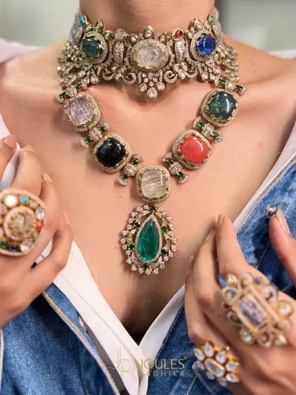 Not just jewelry, it’s the moment. This stunning Navratna-inspired set combines multiple gemstones with polki diamonds, creating a vibrant and meaningful piece for the bride who wants her jewelry to tell a story.
