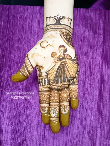 The full Karwachauth design after the henna paste has been applied, showing the rich detail and shading.