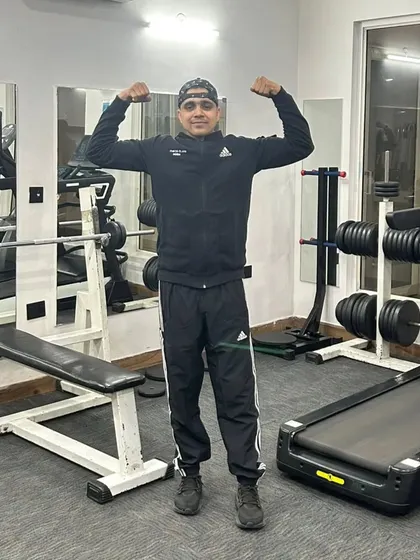 Flexing in the home gym.