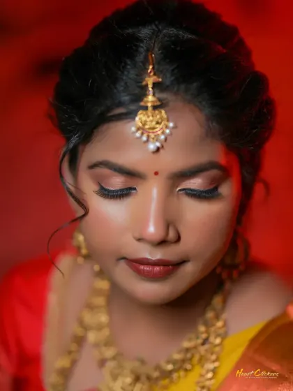 A close-up portrait of the bride-to-be, capturing a moment of quiet contemplation during her engagement shoot.