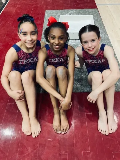 Three of our Level 6 athletes enjoying their time at the state meet in Denton, TX.