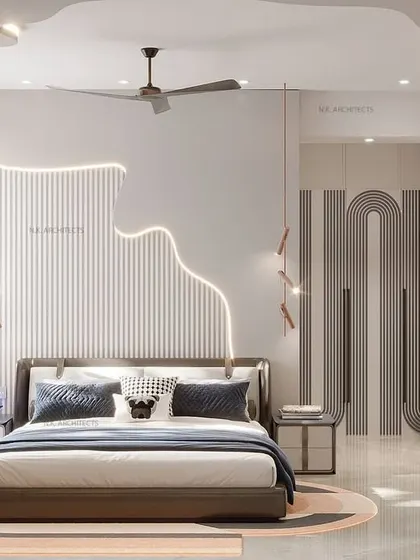 When you are bored with typical false ceilings, explore new ideas with us. This kids' room features a unique, flowing light fixture on the ceiling and walls, creating a dynamic and creative space.