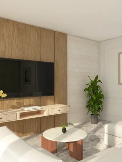 This living room design features a TV wall with a combination of wood veneer, vertical louvers, and a light brick texture. Paired with a comfortable white lounger and minimalist furniture, the space feels modern, warm, and full of interesting textures.