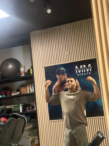 Post-workout flex at the Sector 45 gym.