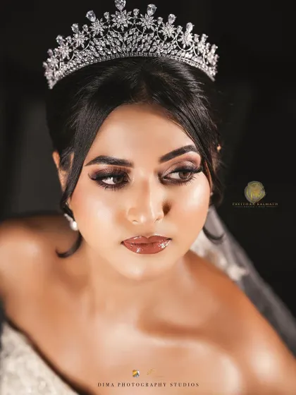 A duplicate of the previous stunning close-up, focusing on the beautiful bridal makeup and accessories.
