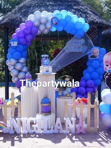 An outdoor Boss Baby party setup under a gazebo, showing how I can adapt themes for any location.
