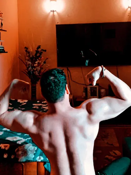 This is what an aesthetic, naturally built back looks like. My programs focus on developing the lats, traps, and lower back for that classic V-taper shape.