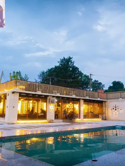 Welcome to your private escape. This is the view of Sasa Cafe from our poolside area at dusk, just as the lights start to create that magical glow. It’s a space I designed for you to leave the city chaos behind and just chill.