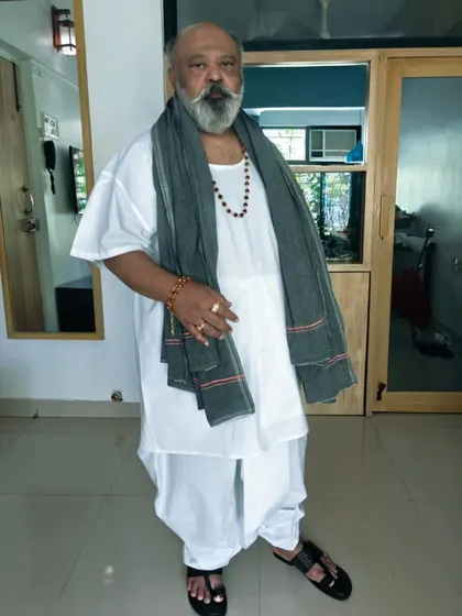 A full-length view of one of the looks I designed for Saurabh Shukla ji. The combination of a white dhoti-kurta and a simple grey scarf creates a distinct, grounded, and powerful village elder look.