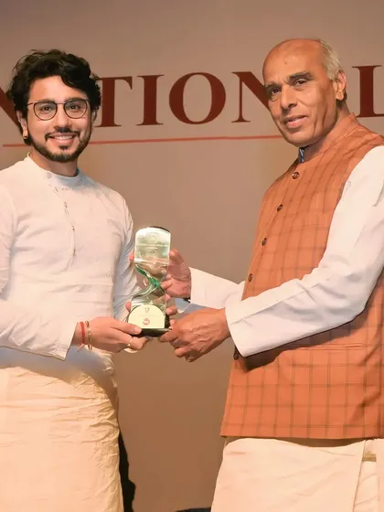 Proudly holding the National Icon Award 2023 trophy. Each award is a milestone in my artistic and spiritual journey.