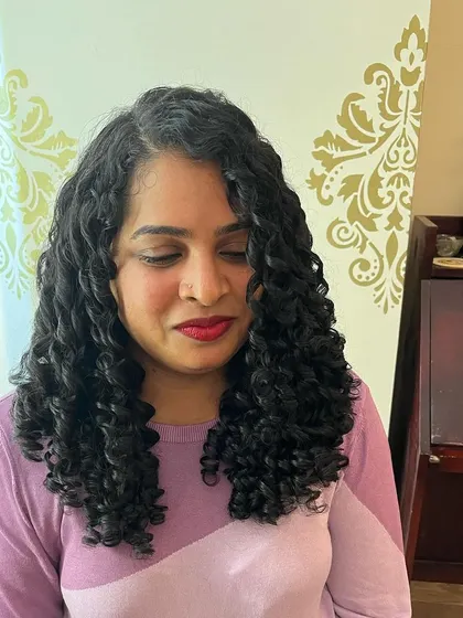 Jeevitha's defined curls after her haircut.