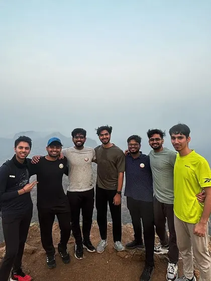A small corporate team at the summit. These treks are excellent for fostering communication and leadership in a practical, hands-on environment.