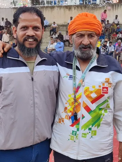 With a fellow coach and veteran of the sport at a Kusti competition. We are here to preserve and promote this powerful part of our culture.