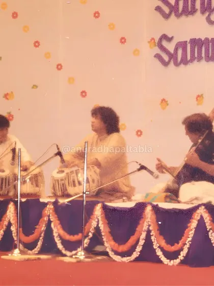A photograph from a performance with my Guru, Ustad Zakir Hussain. He once challenged me to accompany him in a complex 15-beat cycle I had never heard before, teaching me a lifelong lesson in adaptability and confidence.