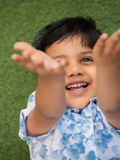An expressive and playful moment during an outdoor kids' photoshoot. I encourage kids to have fun and be themselves in front of the camera.