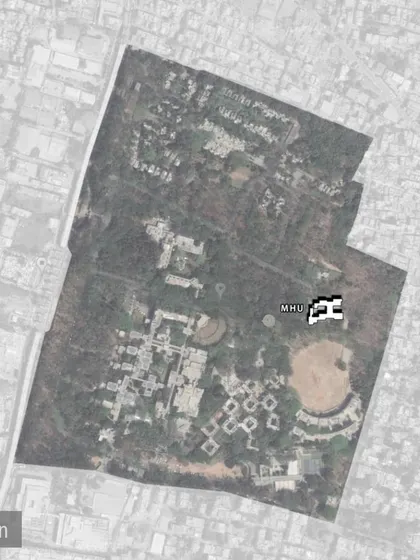 The location of the Married Student Housing (MHU) on the IIM-B campus, adjacent to the playground.